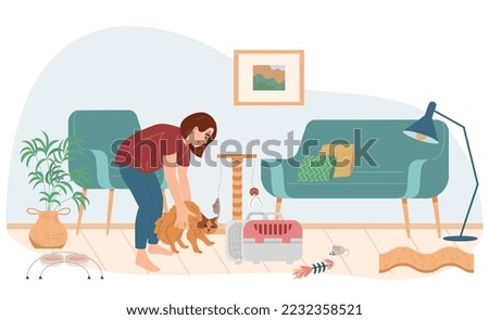 Cat accessories flat composition of living room interior with condo pet carrier and girl holding cat vector illustration