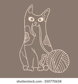 Cat with a ball, knitting kitten, cat playing with tangle on brown background