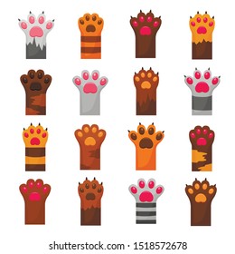 Cat cute paws flat color vector illustrations set. Domestic animal, pet footprint isolated cartoon cliparts pack. Stripy grey and ginger kitten paws cartoon design elements collection
