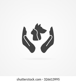 Cat and dog between hands simple flat icon. Shadow and white background.