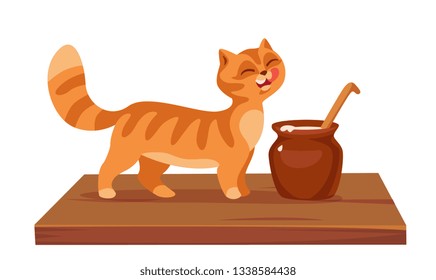 cat eats sour cream on the table from a ceramic bowl