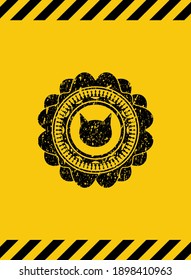 cat face icon black grunge emblem with yellow background. Vector Illustration. Detailed. 