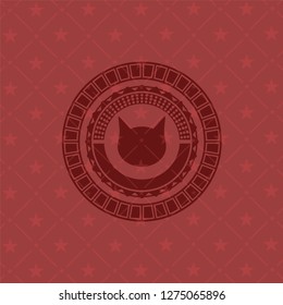 cat face icon inside badge with red background