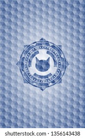 cat face icon inside blue emblem with geometric background.