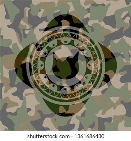 cat face icon inside camouflaged emblem