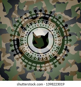cat face icon inside camouflaged emblem