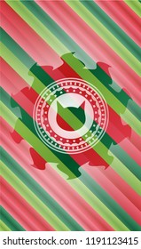 cat face icon inside christmas badge.
