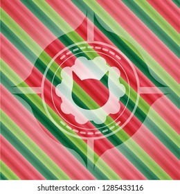 cat face icon inside christmas emblem.