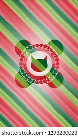 cat face icon inside christmas badge background.