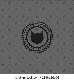cat face icon inside dark badge or emblem