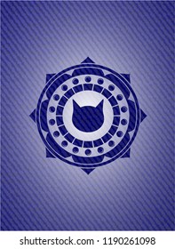 cat face icon inside denim background