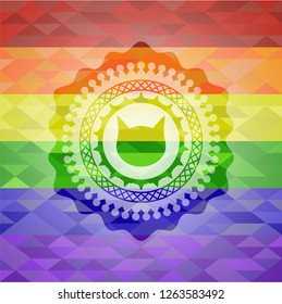 cat face icon inside emblem on mosaic background with the colors of the LGBT flag