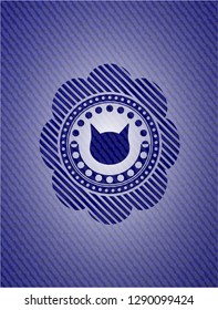cat face icon inside emblem with denim texture