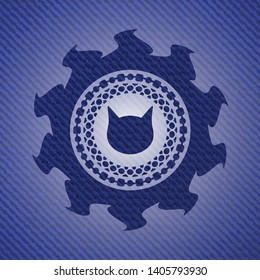 cat face icon inside emblem with denim texture