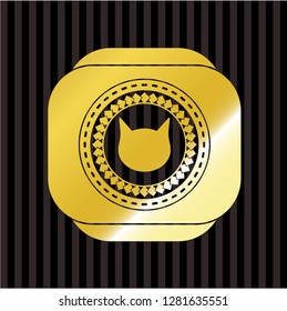 cat face icon inside gold badge or emblem