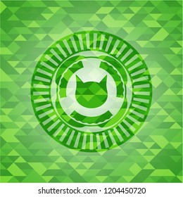 cat face icon inside green emblem with triangle mosaic background