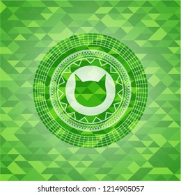 cat face icon inside green emblem with mosaic ecological style background