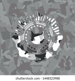 cat face icon inside grey camo emblem