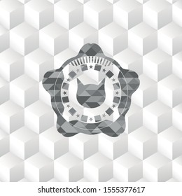 cat face icon inside grey badge with geometric cube white background