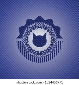 cat face icon inside jean or denim emblem or badge background