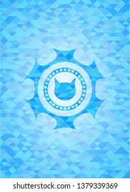 cat face icon inside light blue mosaic emblem