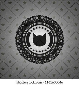 cat face icon inside realistic dark emblem