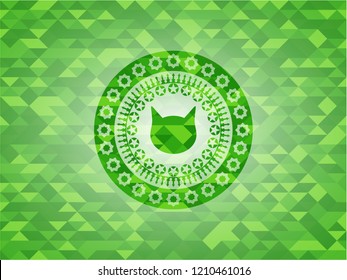 cat face icon inside realistic green mosaic emblem