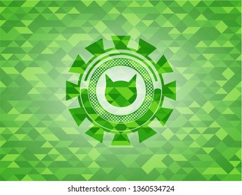 cat face icon inside realistic green mosaic emblem