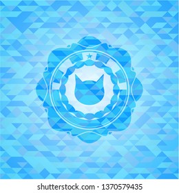 cat face icon inside realistic light blue mosaic emblem