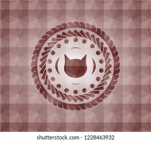 cat face icon inside red seamless geometric pattern emblem. Seamless.