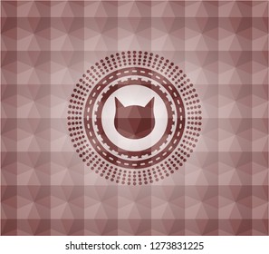 cat face icon inside red seamless emblem or badge with geometric pattern background.