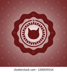 cat face icon inside red emblem