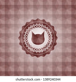 cat face icon inside red seamless geometric pattern emblem. Seamless.