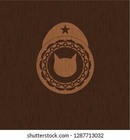 cat face icon inside retro wood emblem