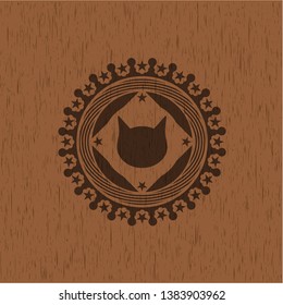cat face icon inside retro style wood emblem
