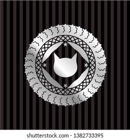cat face icon inside silver emblem or badge