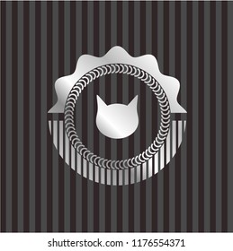 cat face icon inside silvery emblem or badge