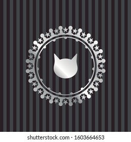 cat face icon inside silvery badge or emblem
