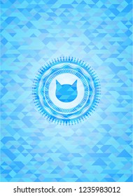 cat face icon inside sky blue emblem with triangle mosaic background