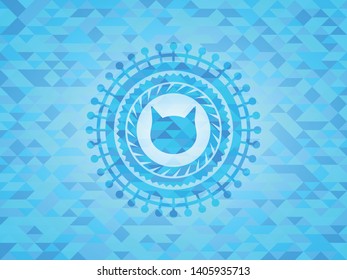 cat face icon inside sky blue mosaic emblem