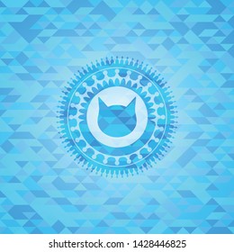 cat face icon inside sky blue mosaic emblem
