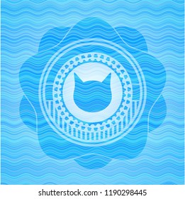 cat face icon inside water concept badge background.