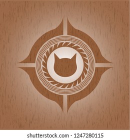 cat face icon inside wood badge or emblem