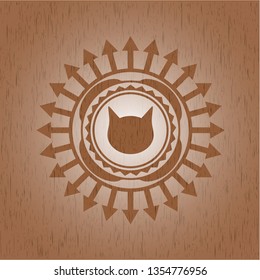 cat face icon inside wood emblem
