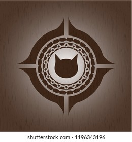 cat face icon inside wooden emblem. Vintage.