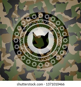 cat face icon on camouflage texture