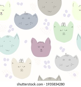 Cat faces on a white background. Yellow, gray, blue, brown, purple, green colors. Pattern.