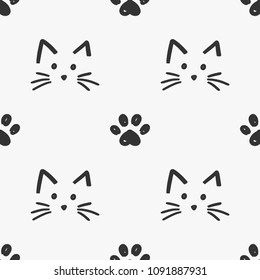 Cat Faces And Paws Seamless Pattern Vector