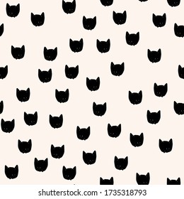 Cat faces seamless pattern. Black and beige vector background. Sipmle pet graphics.