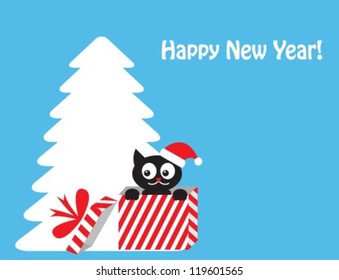 cat in gift box on the background of the Christmas tree